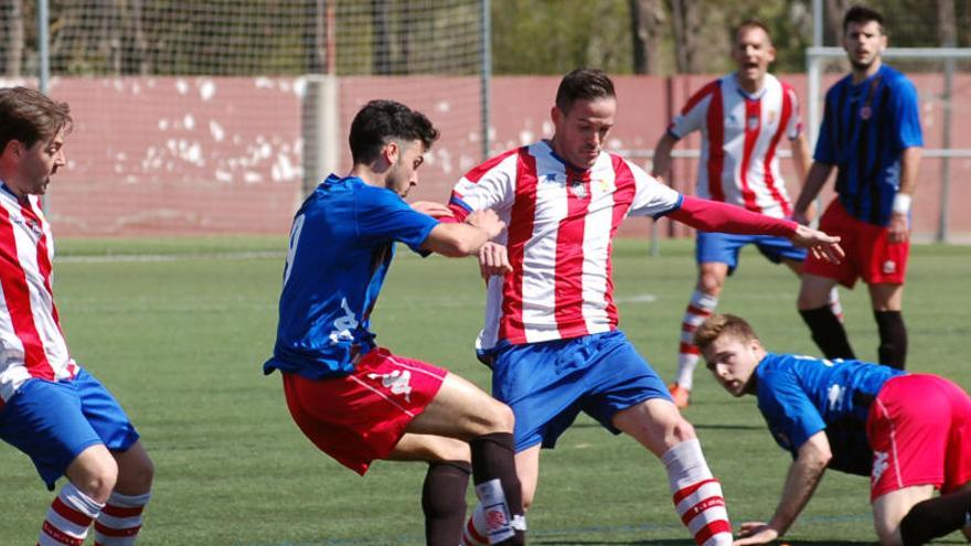 Un moment del partit entre manresans i gironins.