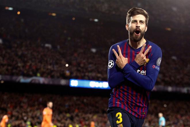 El defensa del FC Barcelona Gerard Piqué celebra su gol, cuarto del equipo ante el Olympique de Lyon, durante el partido de vuelta de los octavos de final de la Liga de Campeones que FC Barcelona y Olympique de Lyon juegan esta noche en el Camp Nou,