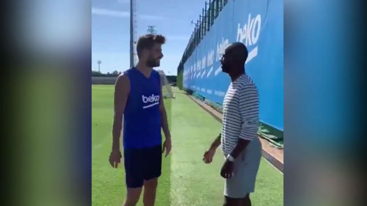 Chris Paul, con Gerard Piqué en en el entrenamiento del Barça