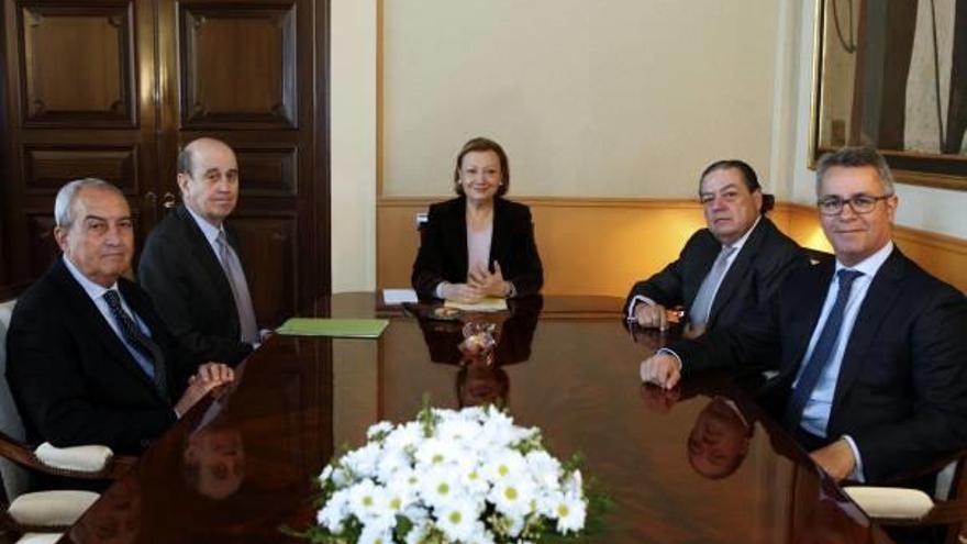 Los empresarios valencianos Federico Félix, Vicente Boluda y Diego Lorente, con L. F. Rudi en 2015.