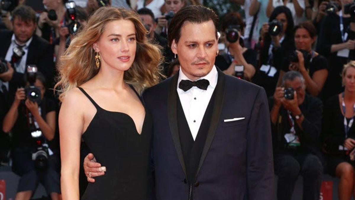 Amber Heard y Johnny Depp en el estreno de 'Black Mass' en el Festival de Venecia