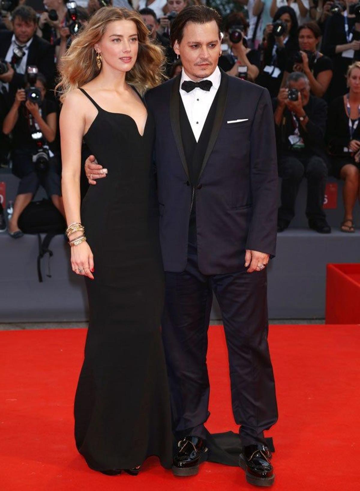 Amber Heard y Johnny Depp en el estreno de 'Black Mass' en el Festival de Venecia