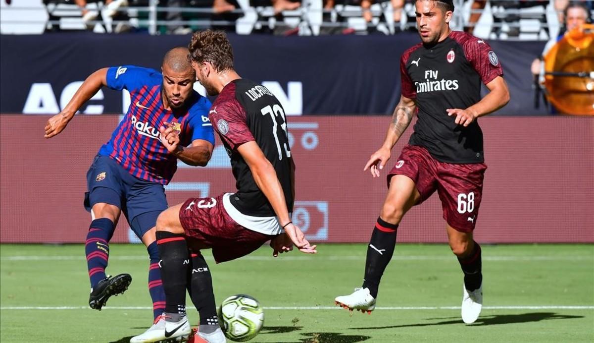 jdomenech44547756 rafinha of barcelona fights for the ball with manuel locatel180805043231