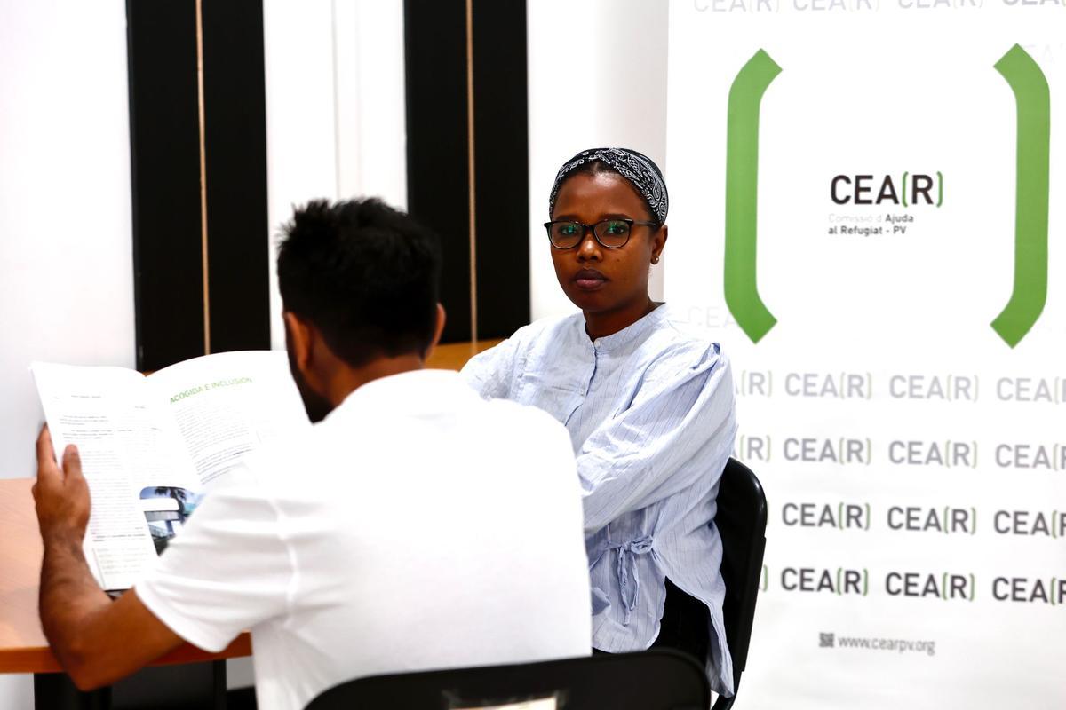 Tsabeeh Adil, de frente y Abdul, de espaldas.