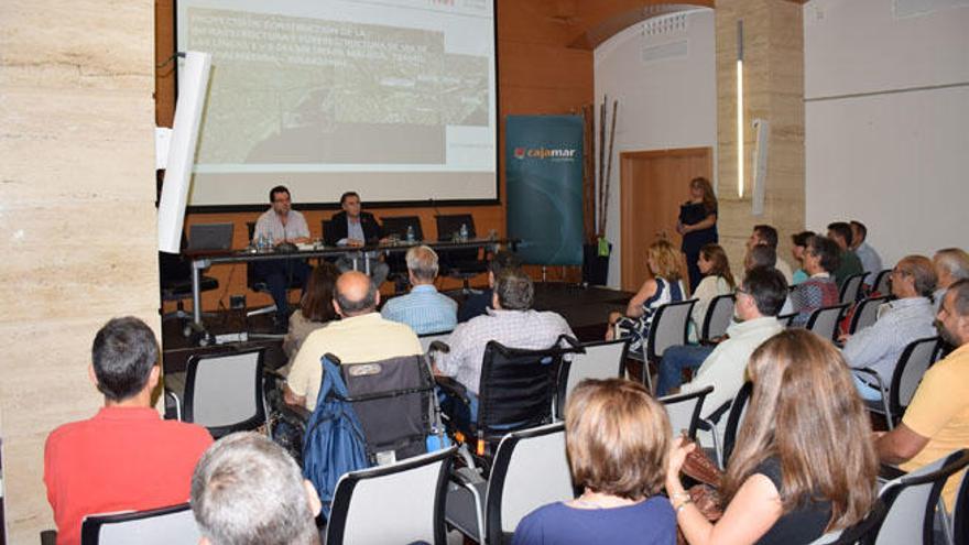 Un momento de la reunión informativa con los vecinos y comerciantes del Centro de Málaga.