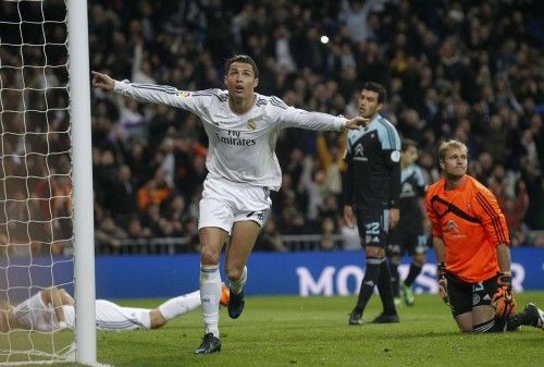 Real Madrid's Cristiano Ronaldo celebrates his goal against Celta Vigo during their Spanish First Division soccer match at Santiago Bernabeu stadium in Madrid
