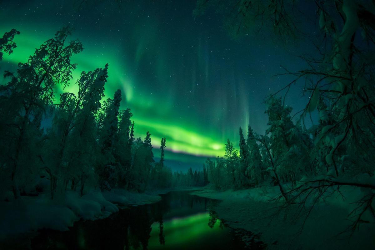 Aurora Borealis (Northern Lights) is seen in the sky over Muonio in Lapland