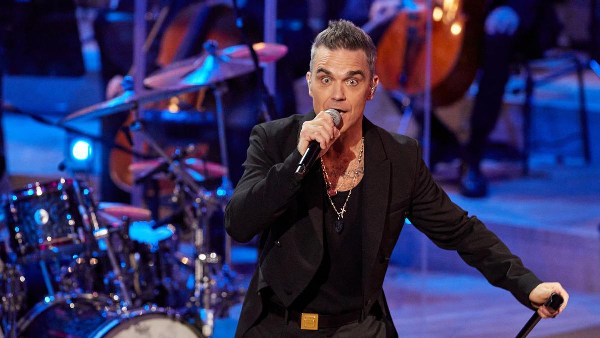 Robbie Williams durante un concierto.