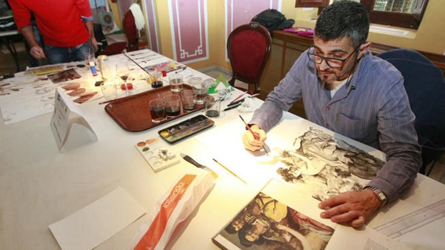 Los artistas trabajan en sus pinturas durante el encuentro en el Palacete de la Seda.