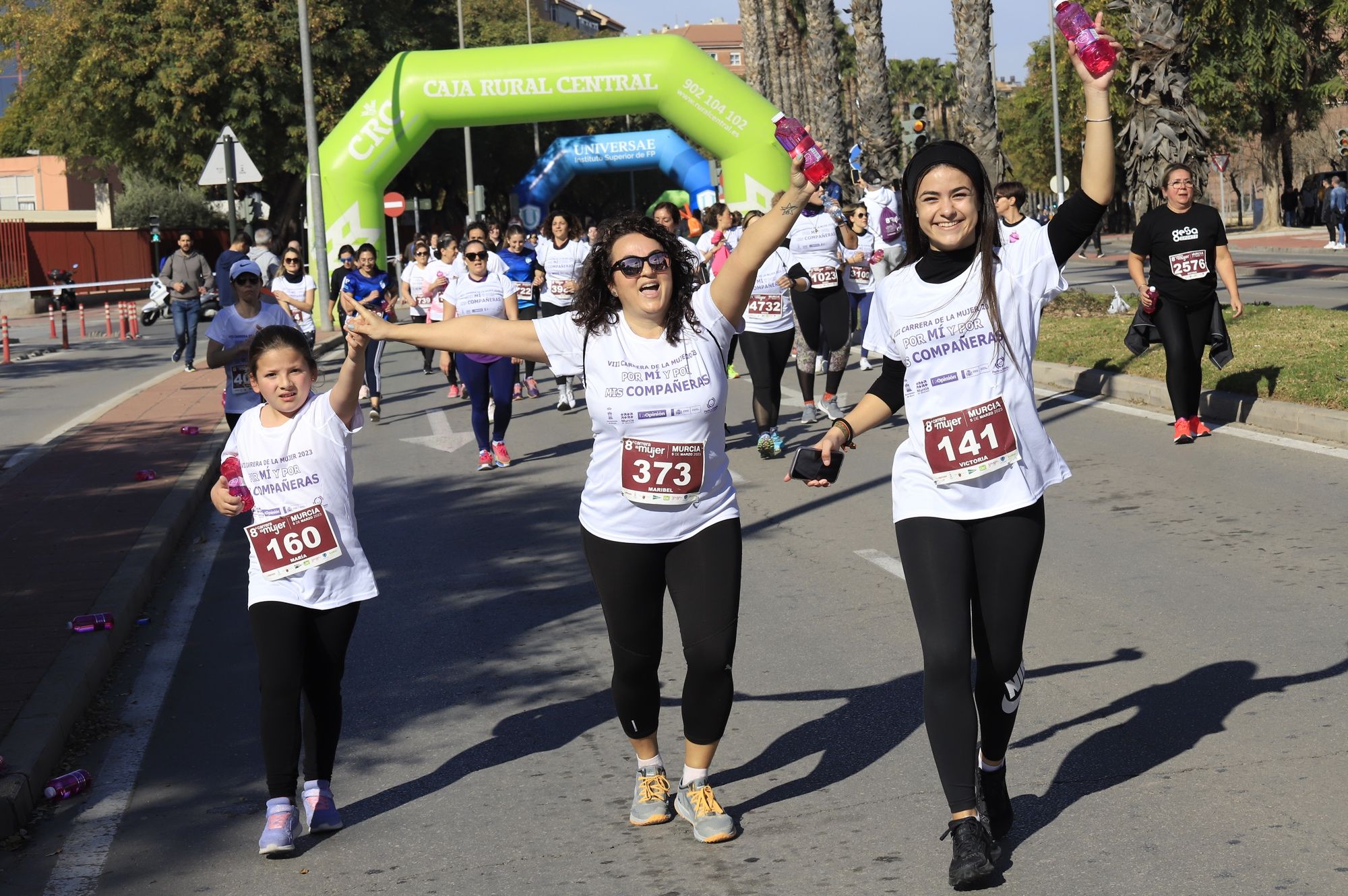 La salida y el recorrido de la Carrera de la Mujer 'inmortalizados' en imágenes