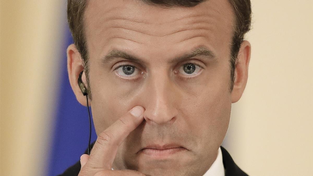 lmmarco39788987 french president emmanuel macron touches his face during a j170824182837