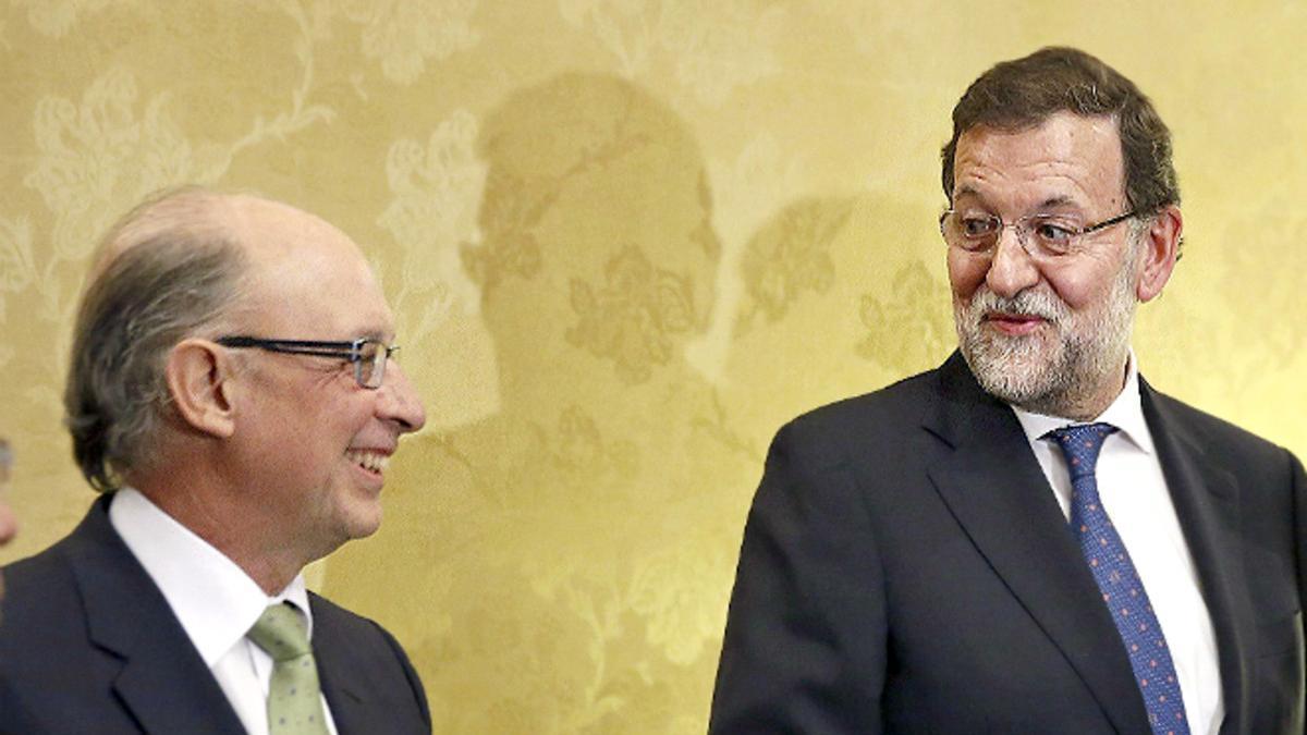 Montoro y Rajoy.