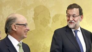 Cristóbal Montoro y Mariano Rajoy. 
