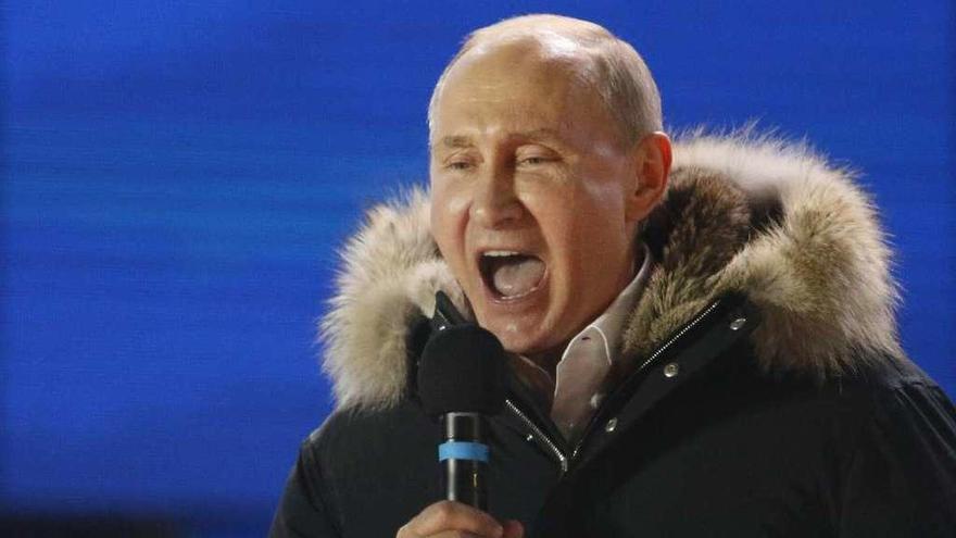 Putin, durante el último mitin de campaña de las presidenciales. // Reuters