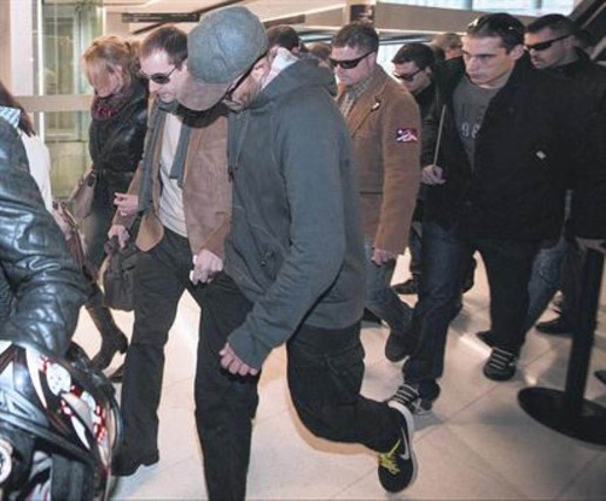 Un grup de mossos escorten alguns imputats a la Ciutat de la Justícia. Un grup de mossos escorten alguns imputats a la Ciutat de la Justícia.