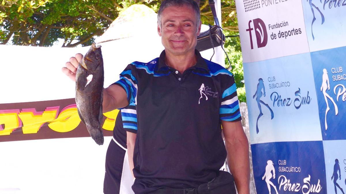 El fallecido, en un reciente campeonato de pesca submarina del club al que pertenecía.