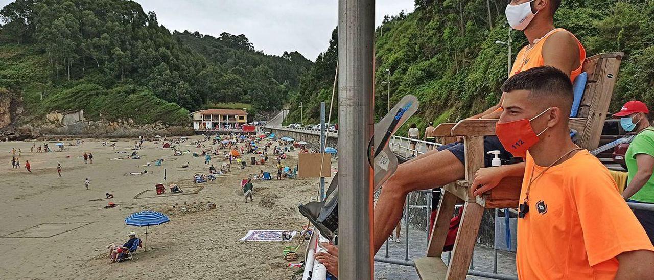 Los socorristas Pepe Vega y Óscar Marqués, vigilando ayer la zona de baños de la playa de Aguilar.