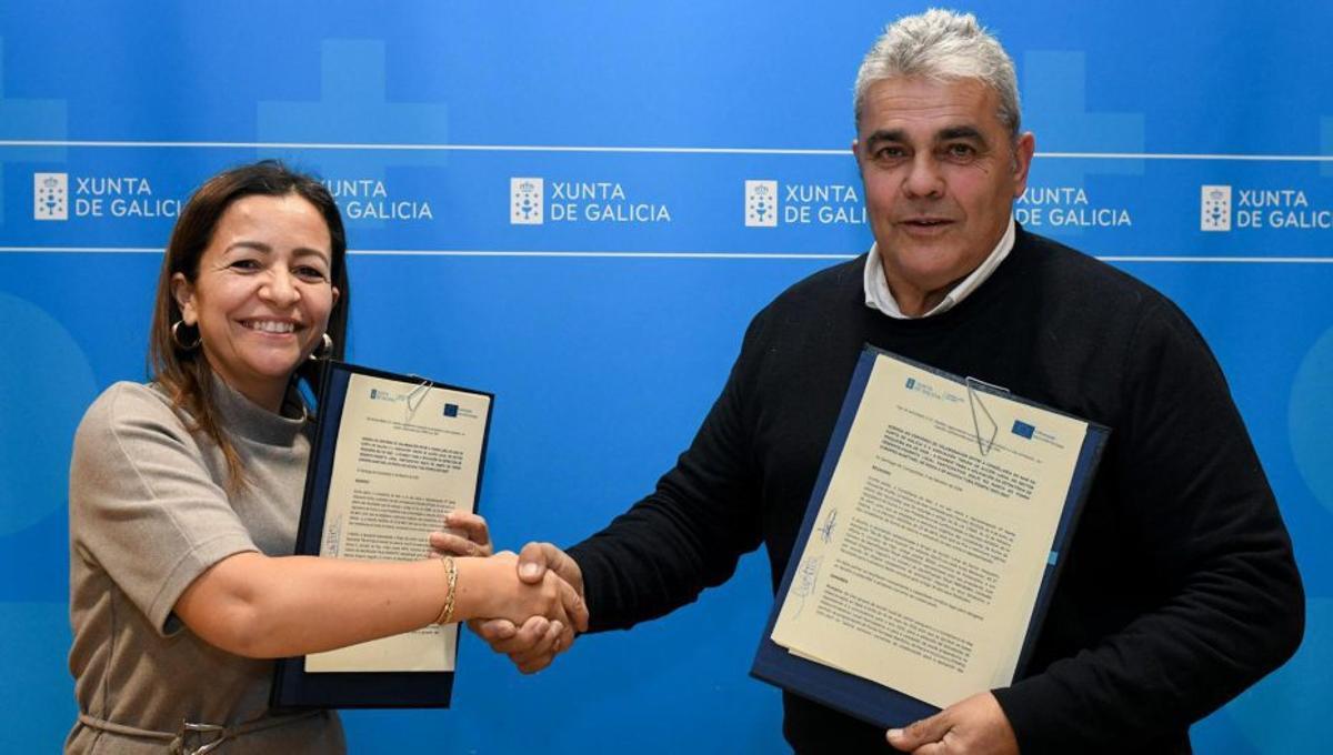 Marta Villaverde y Juan Manuel Gregorio en la firma en Santiago.