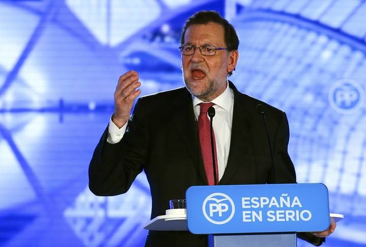 Spanish Prime Minister and People's Party (PP) leader Mariano Rajoy delivers a speech during a campaign rally ahead of Spain's general election in Valencia