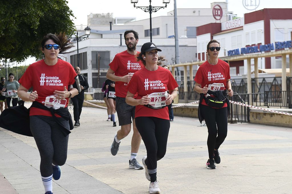 La XIII carrera solidaria Corriendo con Assido, en imágenes