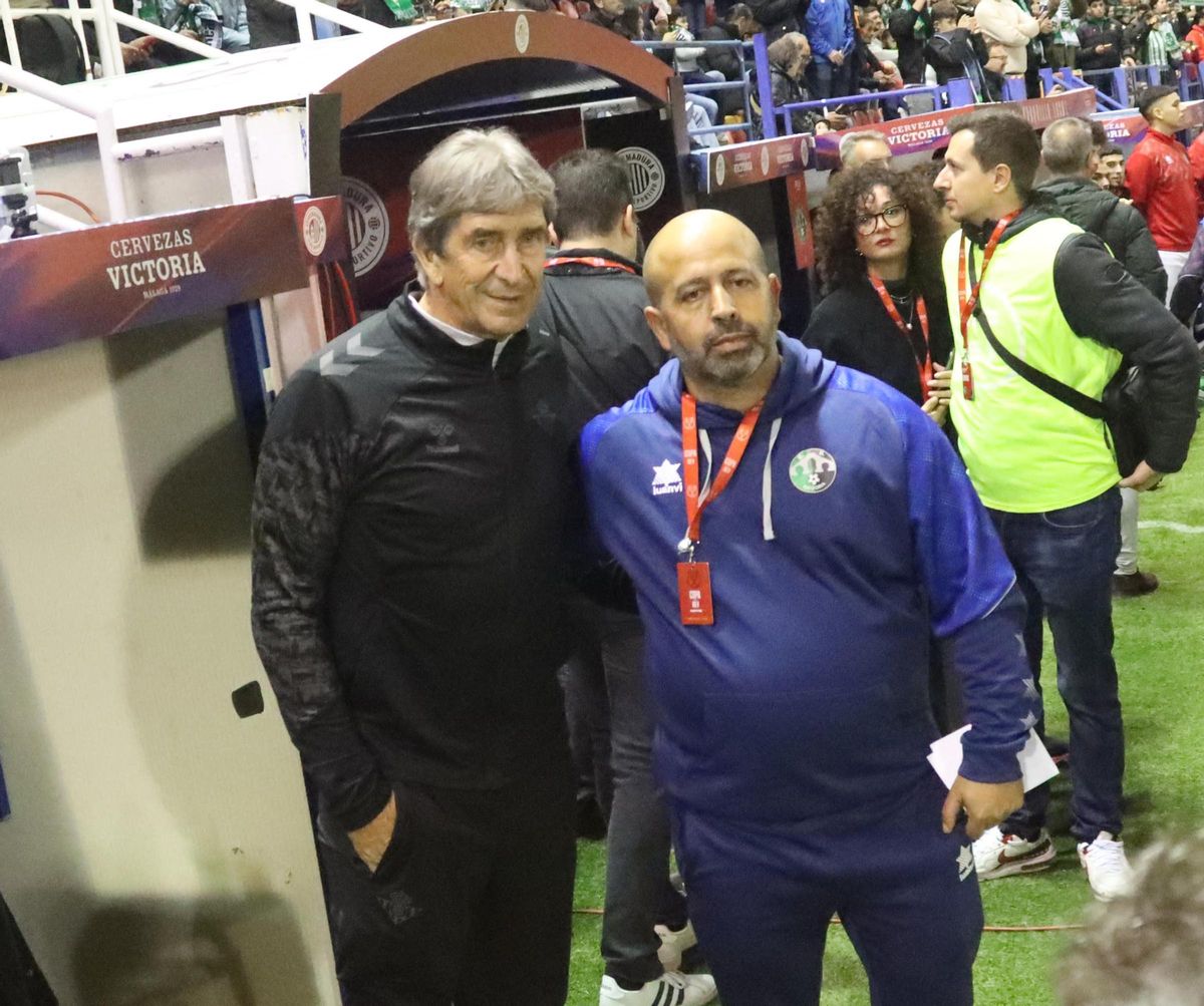 Pellegrini, con Martín Fernández antes del inicio del partido.