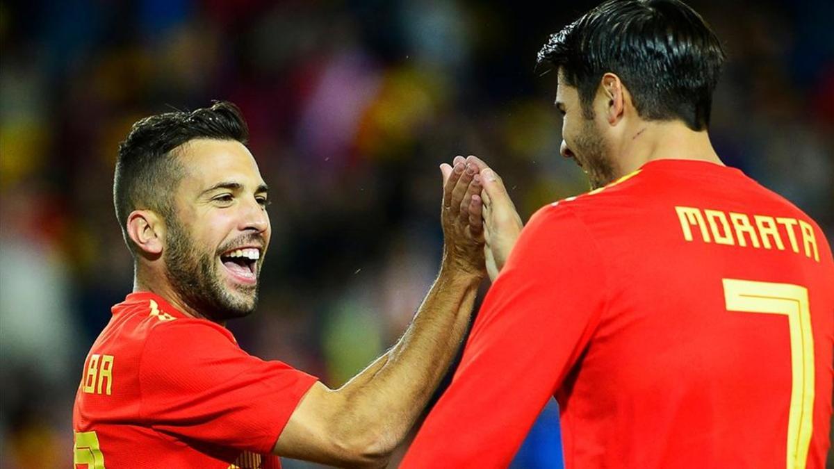 Morata celebra el gol de Alba