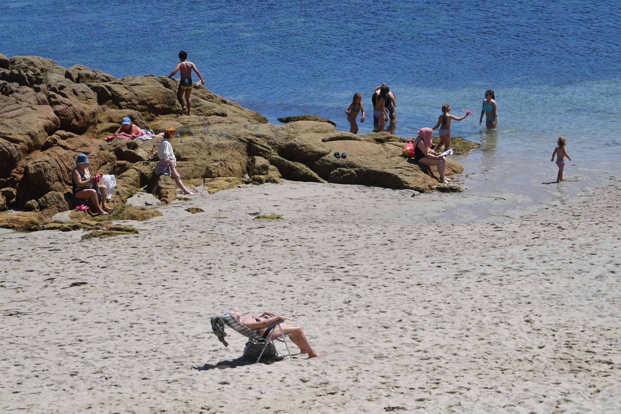 Las altas temperaturas llenan las playas de A Coruña