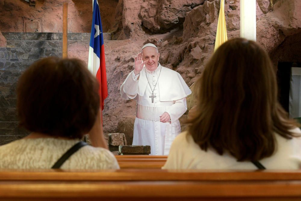 A cut-out of Pope Francis is seen inside a ...