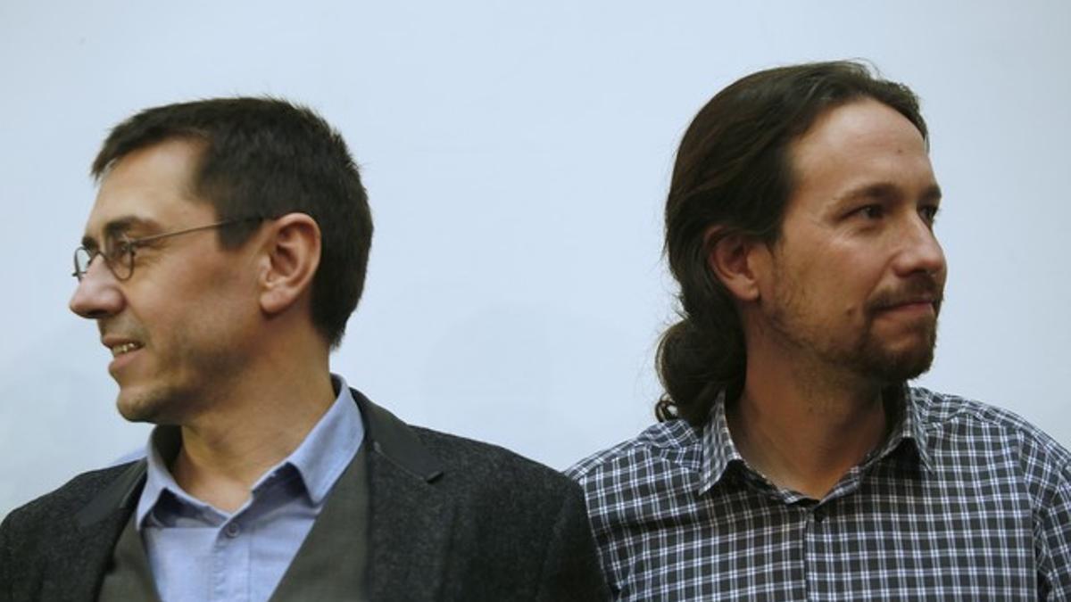 Juan Carlos Monedero y Pablo Iglesias, en una rueda de prensa de Podemos celebrada el pasado 20 de febrero.