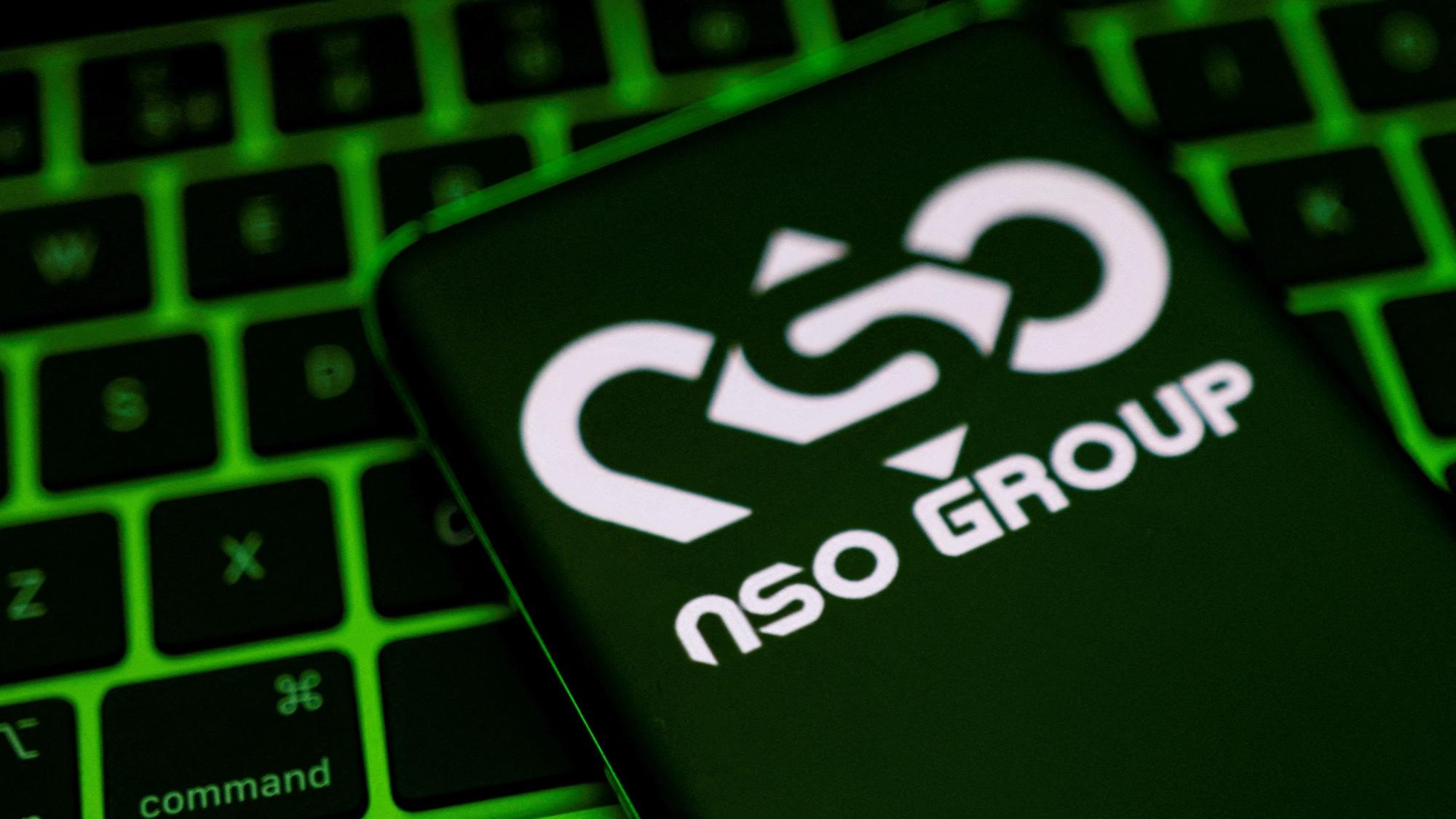 NSO Group logo is shown on a smartphone which is placed on a keyboard in this illustration taken May 4, 2022. REUTERS/Dado Ruvic/Illustration/File Photo