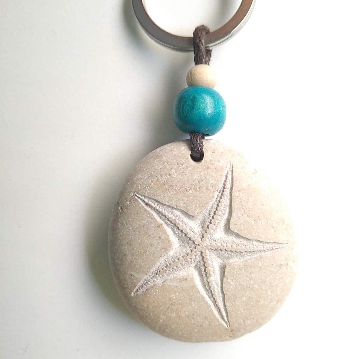 Piedra natural tallada con una estrella de mar, de ARTE25 - Arte en Piedra (13,75 euros)