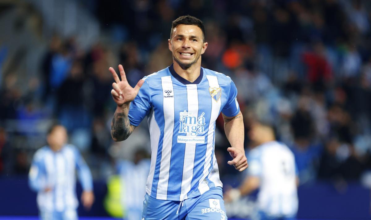 Rubén Castro celebra un gol con el Málaga CF durante la pasada temporada.