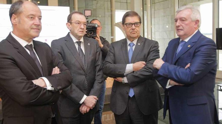 Los tres rectores y el secretario xeral de Universidades, en un acto reciente.