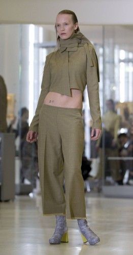 A model presents a creation by by French designer Lea Peckre as part of her Autumn/Winter 2015/2016 women's ready-to-wear collection during Paris Fashion Week