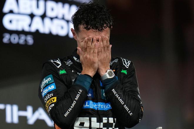 McLaren driver Lando Norris of Britain reacts after becoming a world champion after the Abu Dhabi Formula One Grand Prix in Abu Dhabi, United Arab Emirates, Sunday, Dec. 7, 2025. (AP Photo/Darko Bandic). EDITORIAL USE ONLY / ONLY ITALY AND SPAIN