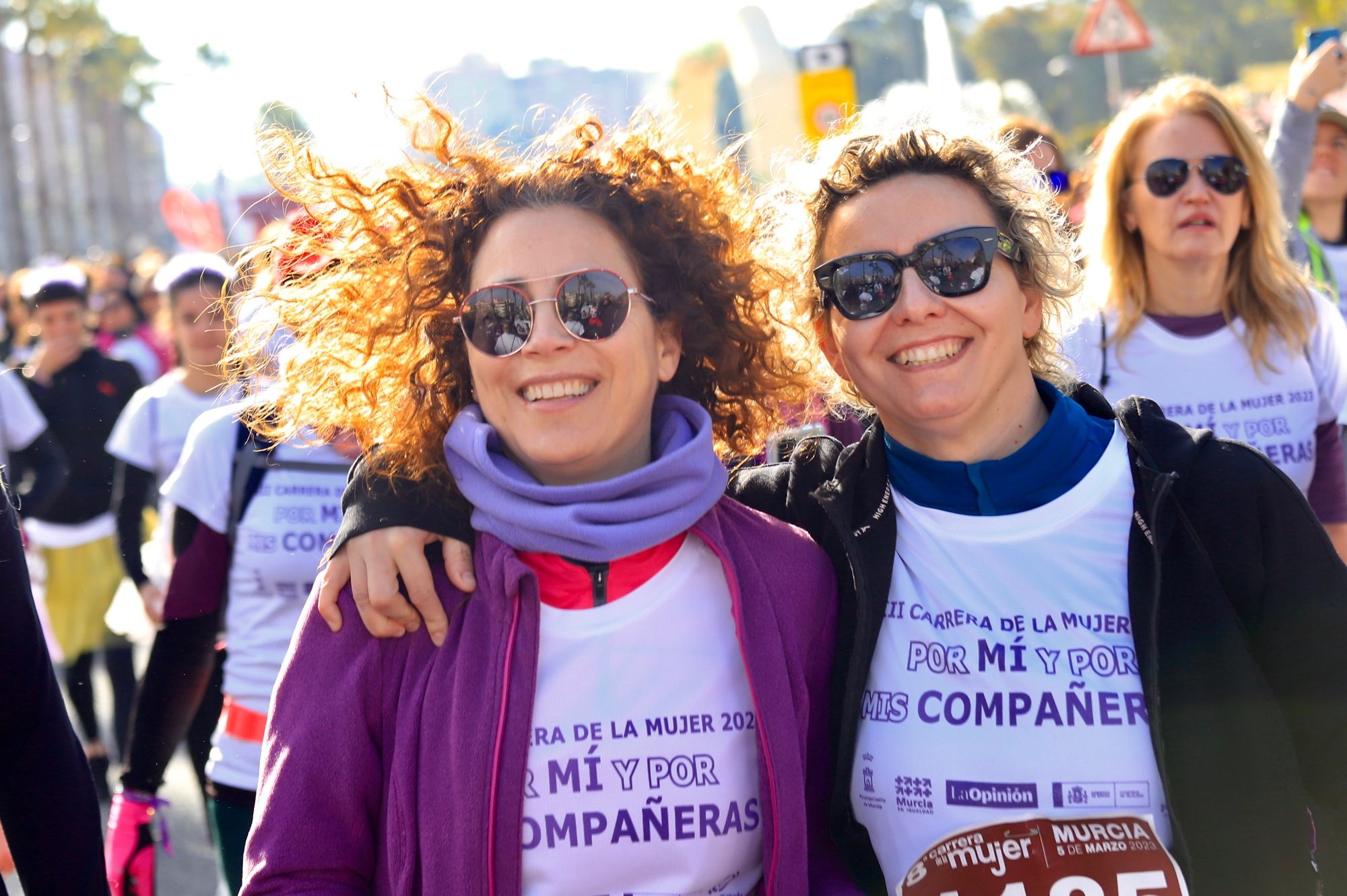 La salida y el recorrido de la Carrera de la Mujer 'inmortalizados' en imágenes