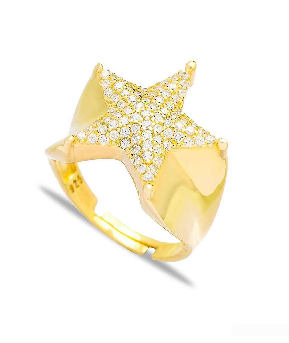 Anillo con forma de estrella de mar en plata/ oro amarillo con circonitas