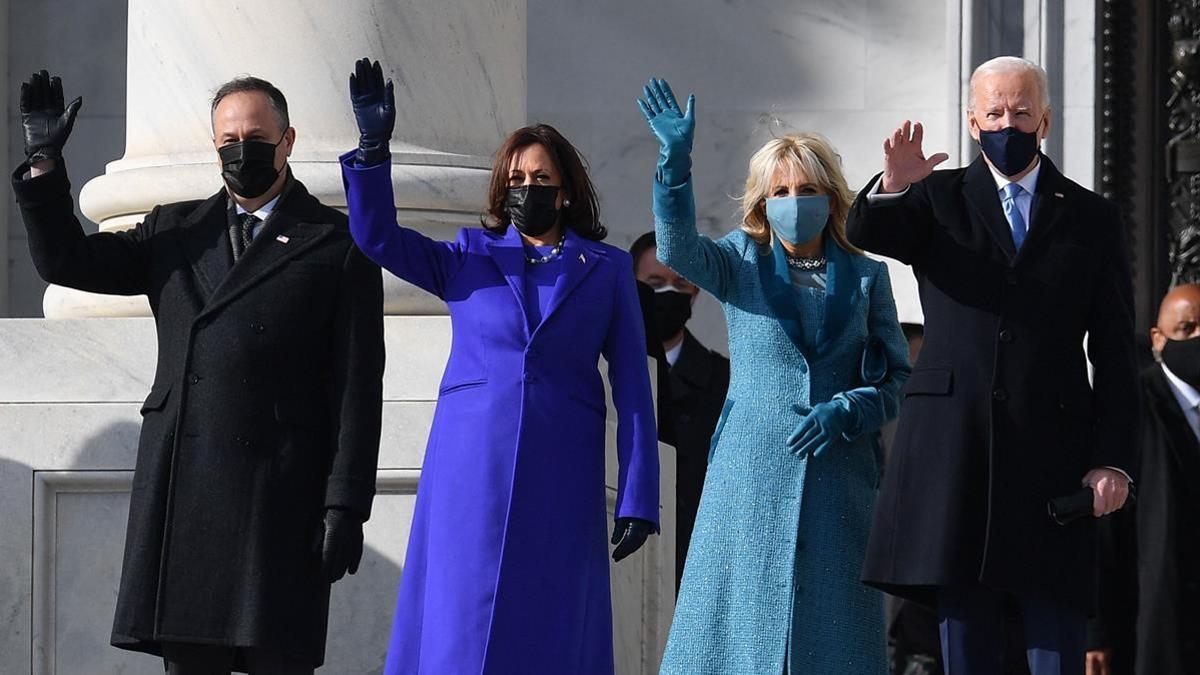 (L-R) Doug Emhoff  US Vice President-elect Kamala Harris  incoming US First Lady Jill Biden  US President-elect Joe Biden arrive for the inauguration of Joe Biden as the 46th US President on January 20  2021  at the US Capitol in Washington  DC  (Photo by ANGELA WEISS   AFP)