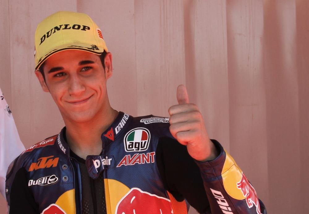 KTM Moto3 rider Salom shows the thumb up to ...