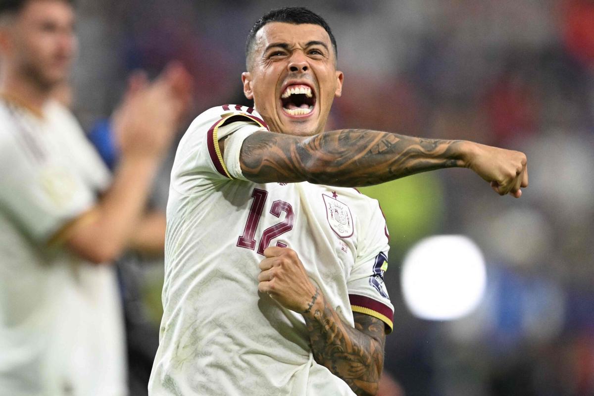 Spain's defender #12 Pedro Porro celebrates winning the 2026 World Cup football tournament semi-final match between France and Spain at the Dallas Stadium in Arlington on July 14, 2026. (Photo by MAURO PIMENTEL / AFP)