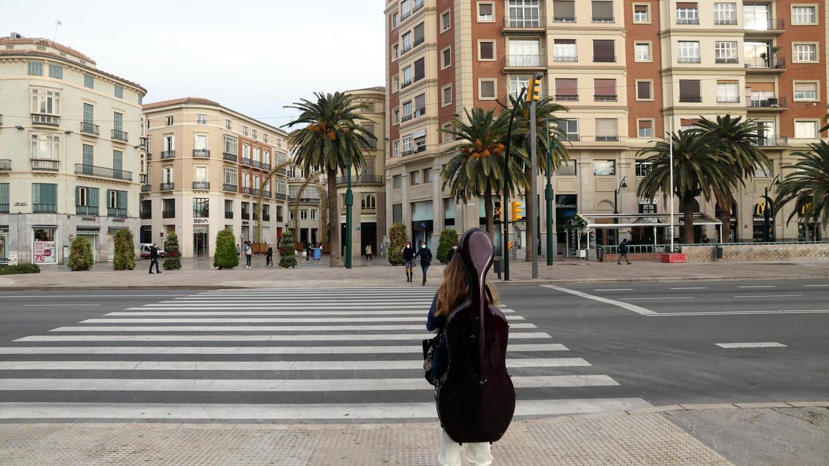 Imágenes de comercios de Málaga cerrados en el primer día de cierre de la actividad no esencial