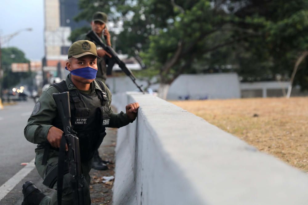 A military member looks on near the Generalisimo ...