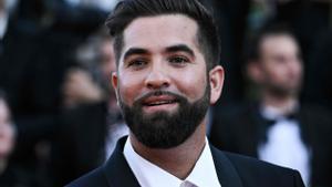 (FILES) French singer Kendji Girac arrives for the screening of the film Armageddon Time during the 75th edition of the Cannes Film Festival in Cannes, southern France, on May 19, 2022. French singer Kendji Girac, seriously injured by a gunshot, is between life and death, a source close to the case told AFP on April 22, 2024. (Photo by LOIC VENANCE / AFP)