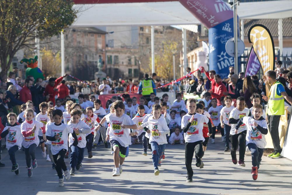 Mil niños y niñas participan en la carrera infantil de Reyes en Palma