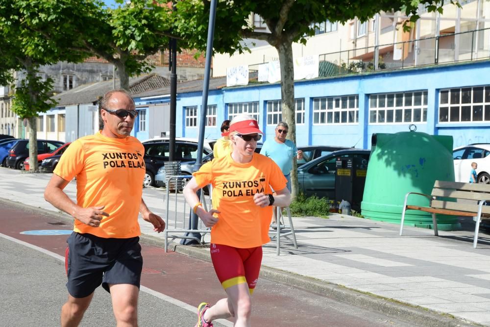 Marea naranja contra el ELA en Cangas