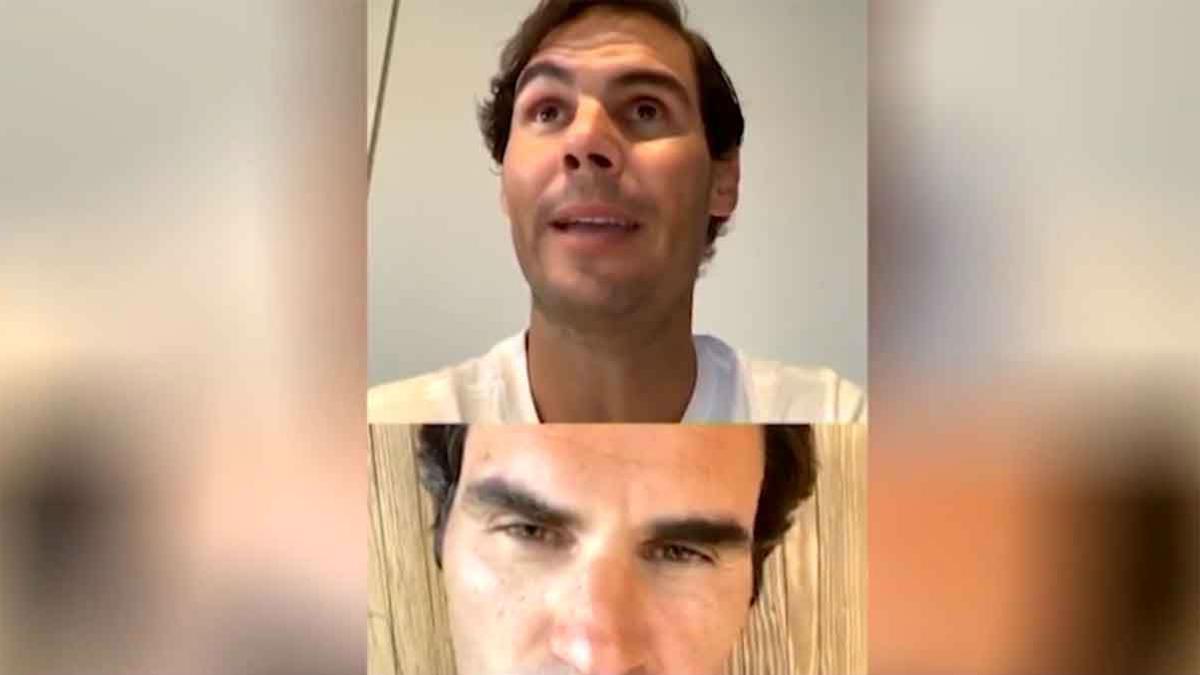 Nadal conversa con Roger Federer