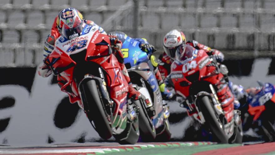 El piloto australiano Jack Miller y el italiano Andrea Dovizioso en acción durante el GP de Austria.