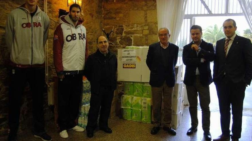 Representantes de Gadis y del Obradoiro, ayer.