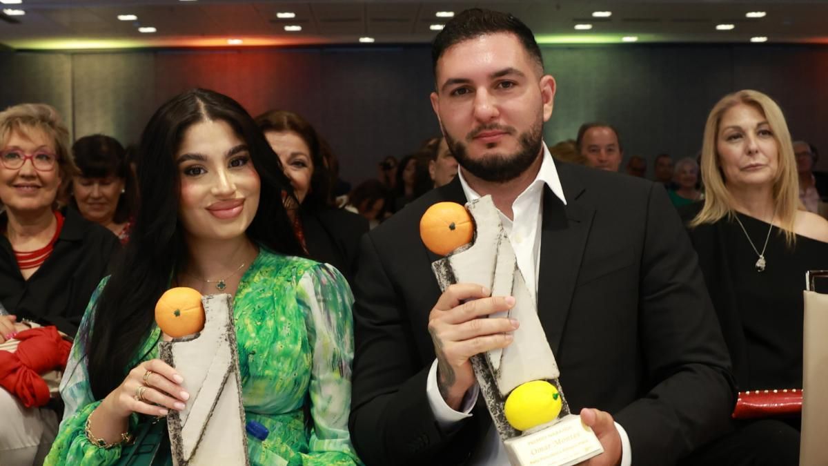 Omar Montes y su pareja Lola Romero en los Premios Naranja y Limon