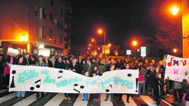 A la izquierda, la cabeza de la marcha. A la derecha, algunos de los manifestantes.| braulio fernández